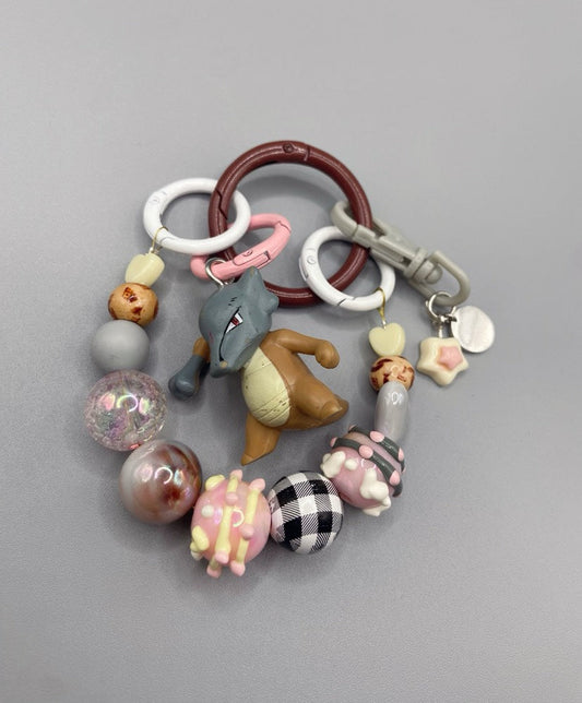 Bijou de sac "OSSATUEUR" bazar bidule